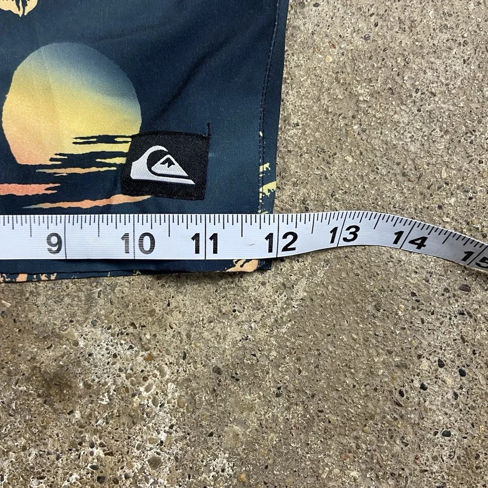 Quiksilver Swim Trunks Size Large Black Orange Palm Tree Sunset Graphic Surfing